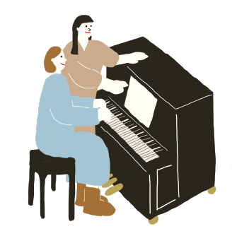 ピアノレッスンを受けている女性